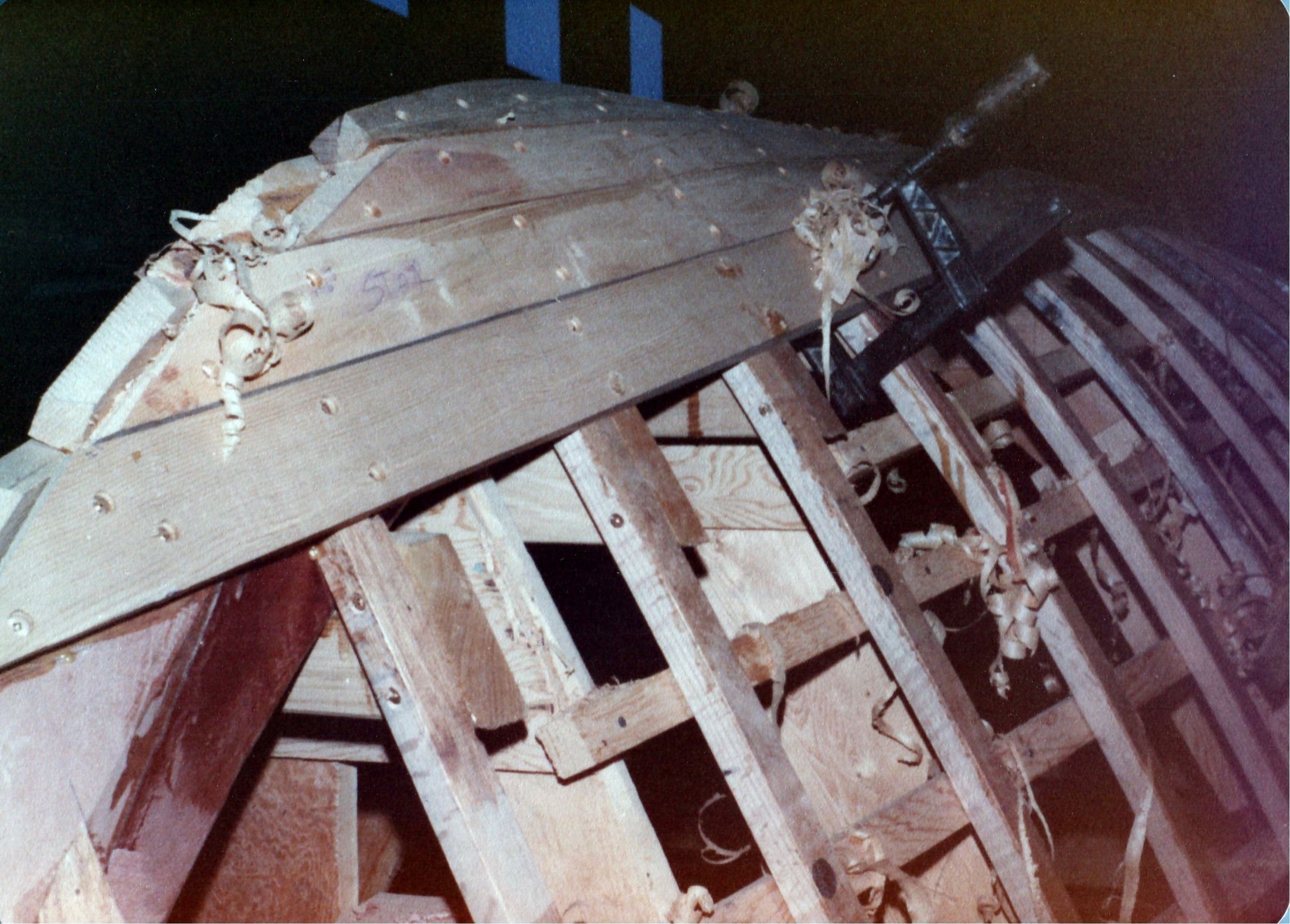 Close view of the stringers and the first planks going on at the bow