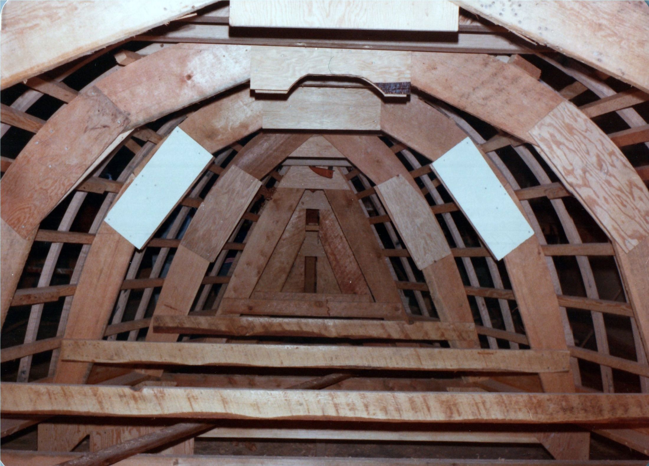 Inside the frames at the stem, two pale plywood gussets