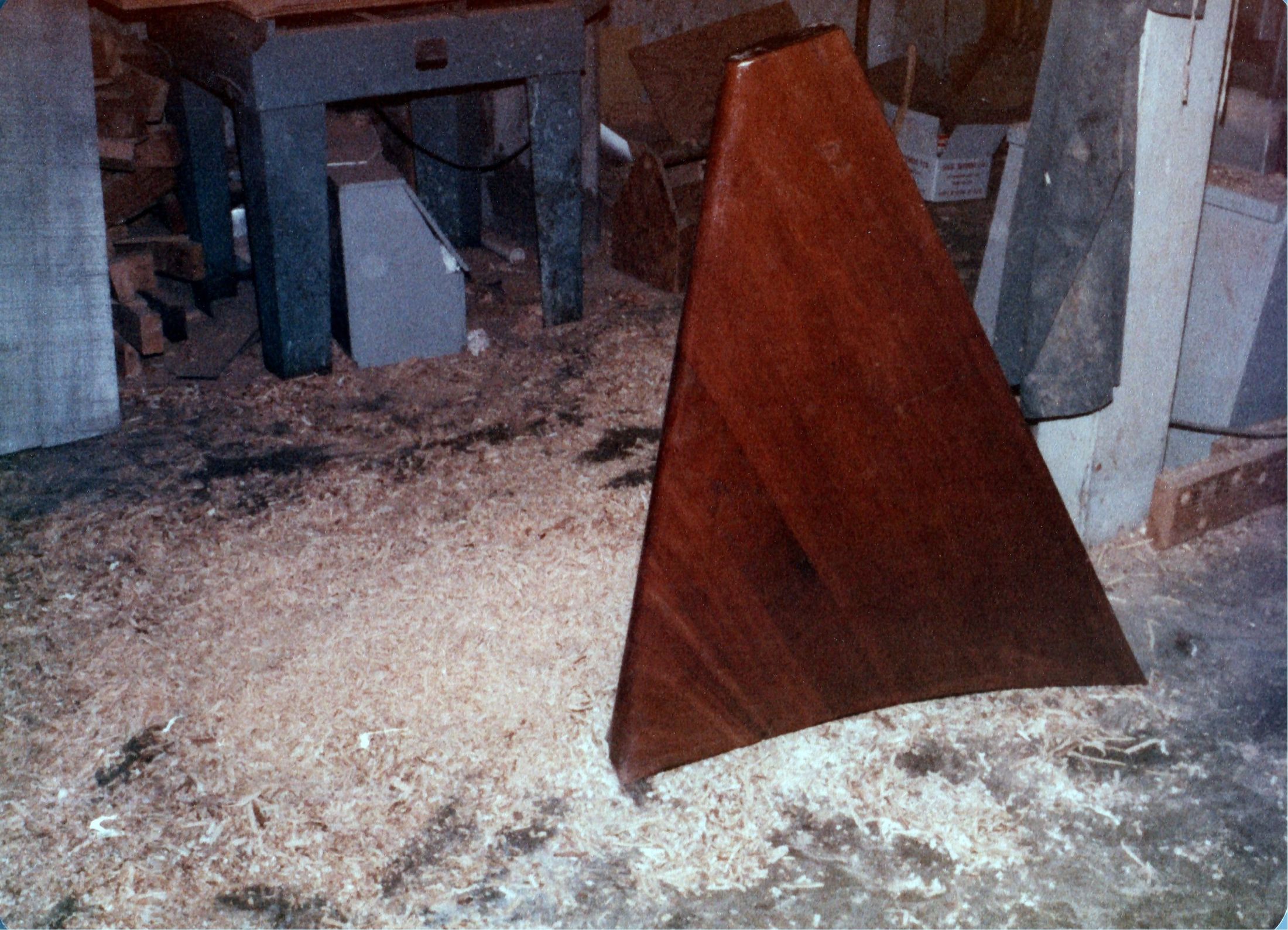 A plywood bulkhead standing on the shop floor
