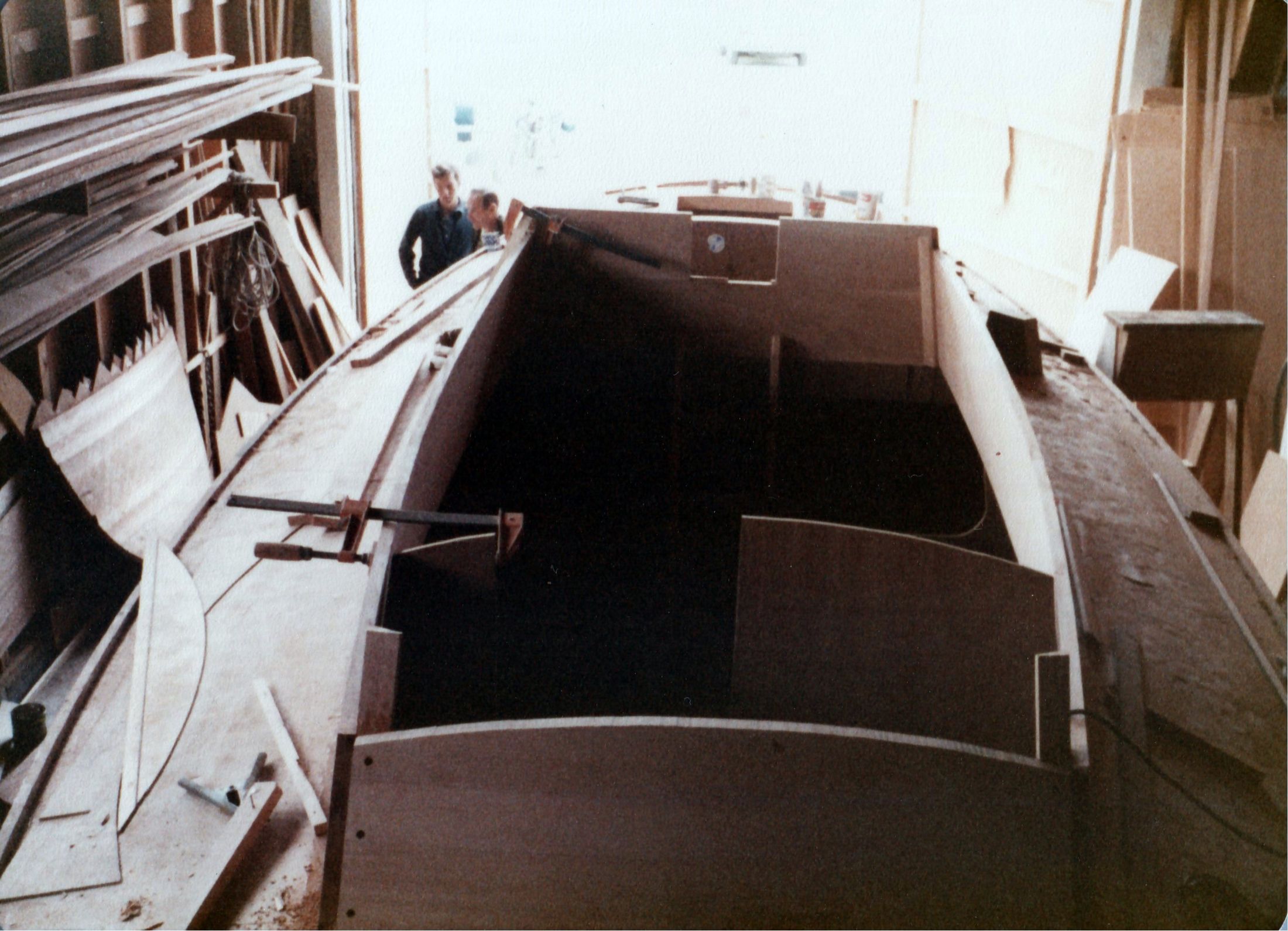 The coach house and cockpit from above, two men on the floor beyond
