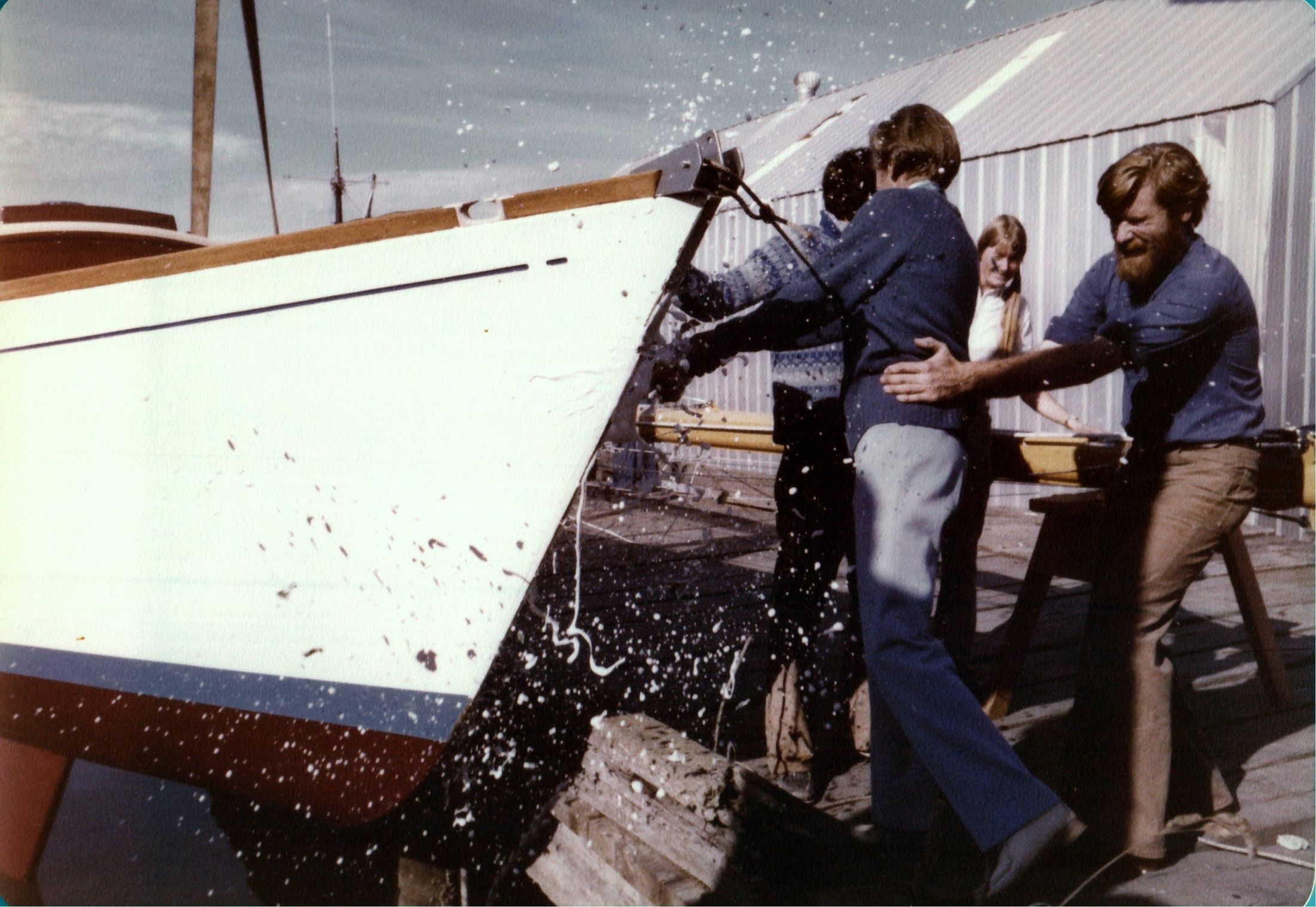 Champagne breaking over the bow