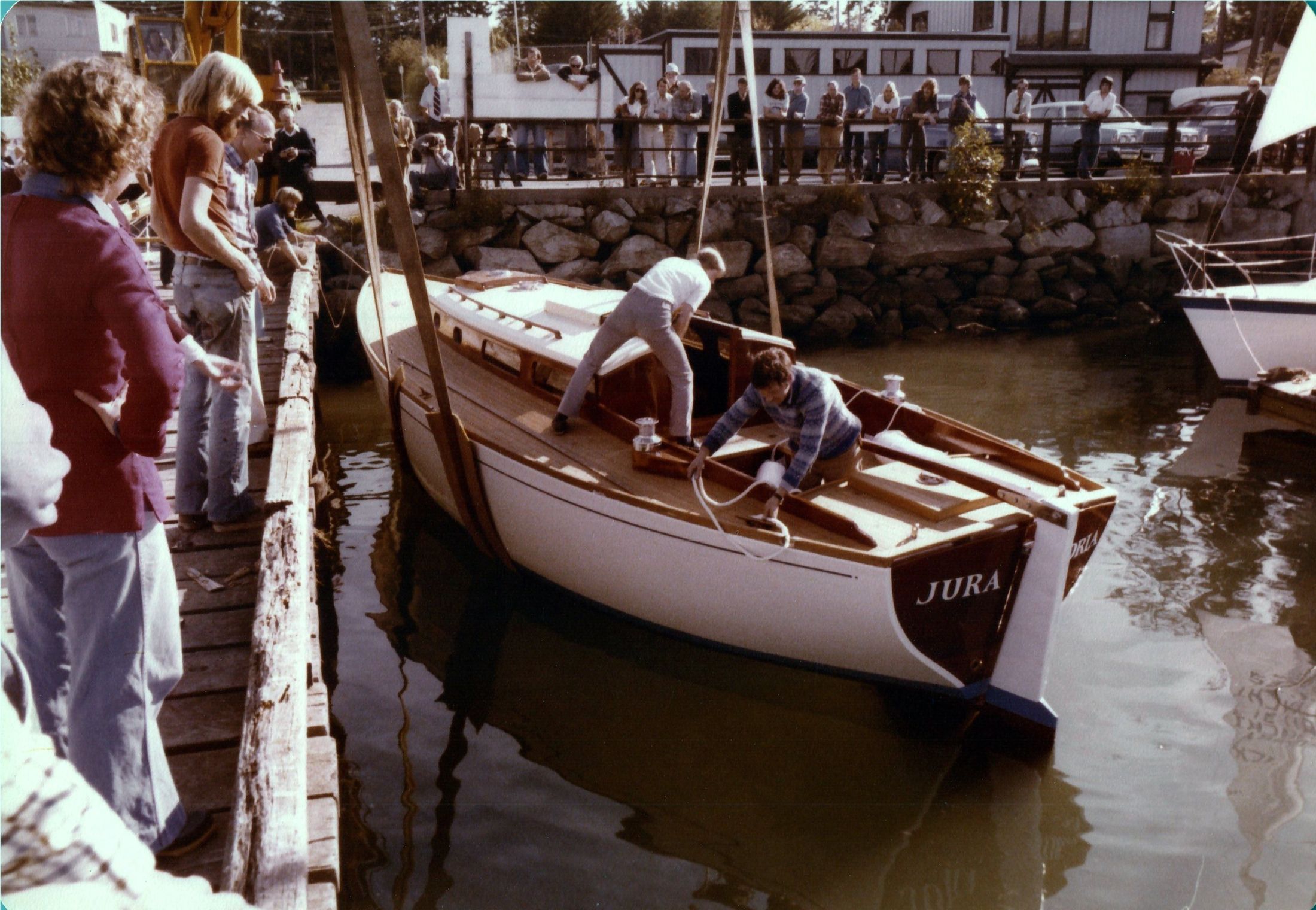 The stern at the dock, JURA lettered on the transom